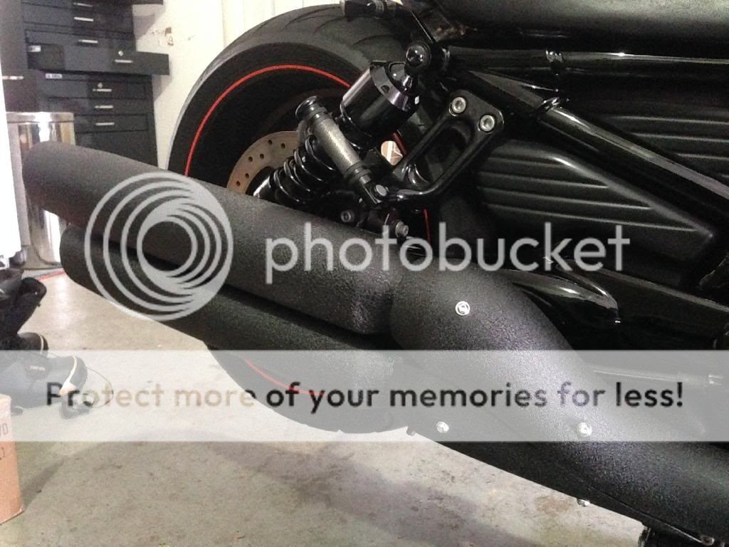 Exhaust tips and covers recently powder coated wrinkle black Harley